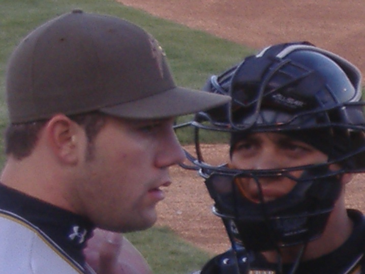 The West Virginia Power battery discuss their strategy before a game against Delmarva. Left is pitcher Zach Braddock and right is catcher Andy DeLaRosa. Braddock pitched 4 1/3 scoreless innings in the Power's 2-1 victory.