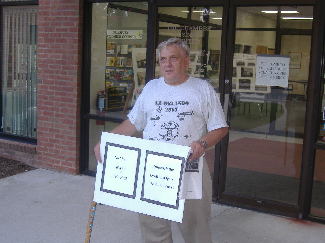 This gentleman wanted both Bush and Cheney impeached. The Vietnam veteran was handing out a cartoon mocking Bush for not having served in Vietnam.