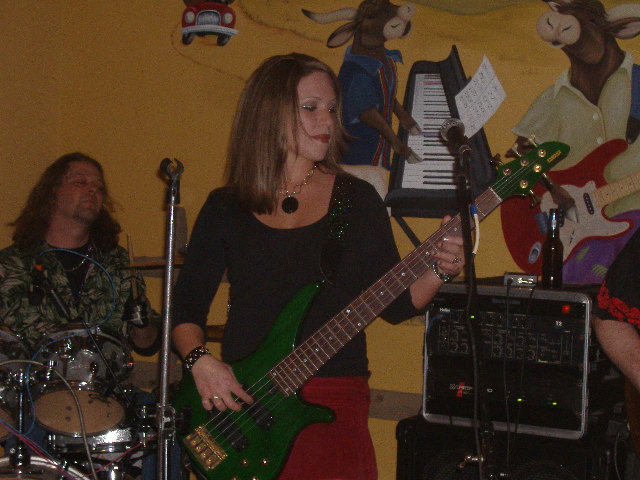 I still dig that bottle-green 5-string bass. Casey carrying it is certainly a nice bonus for the eyes too. By the way I did get a gratuitous Kathy shot - she's the other guitarist - but it won't come out on this post and frankly I'm annoyed about it.